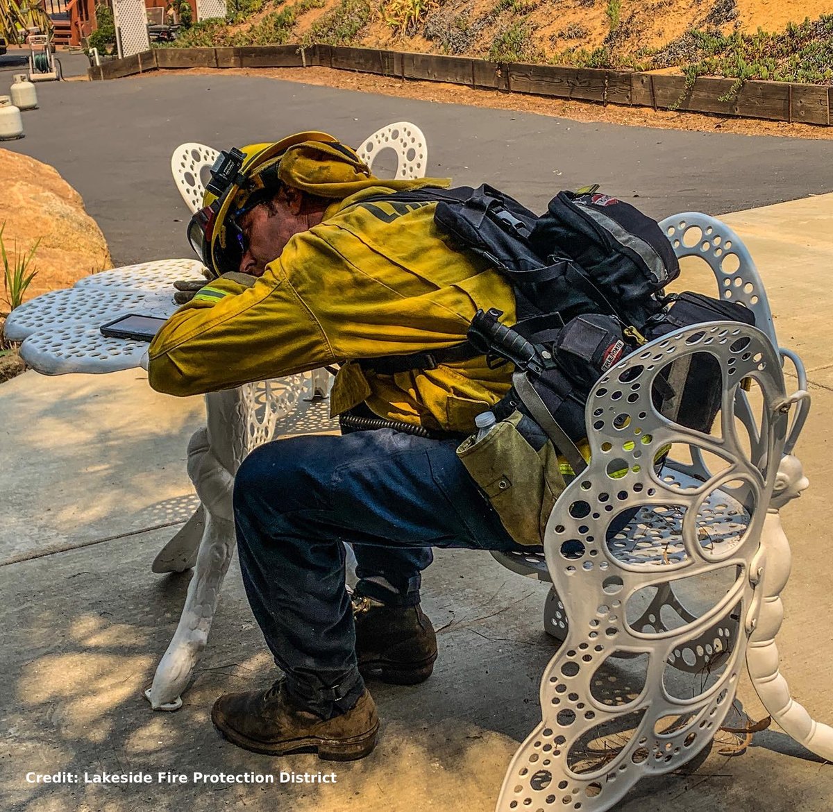 10News's tweet photo. THANK YOU FIREFIGHTERS ❤️ Lakeside Fire Engineer Danny Leetch took a quick break after fighting the #ValleyFire for 26 hours straight in temperatures well into the 100s. (Photo: Lakeside Fire Protection District) https://t.co/wp9Sz54u4C