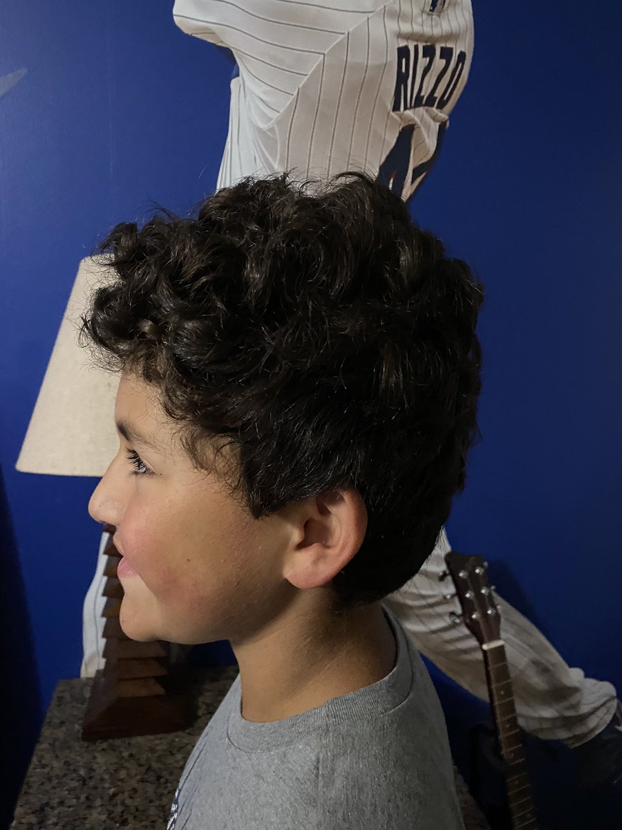VEupierre's tweet photo. @ARizzo44  My son, Danny is refusing to cut his hair until he sees that you’ve cut yours. His curls are sticking out of his baseball cap &amp; he says that’s the point mom, just like Rizzo.  Please tell him to cut his hair, before his 10th birthday on 9/29.  Maybe he’ll listen to you https://t.co/eo5tXHzNR7