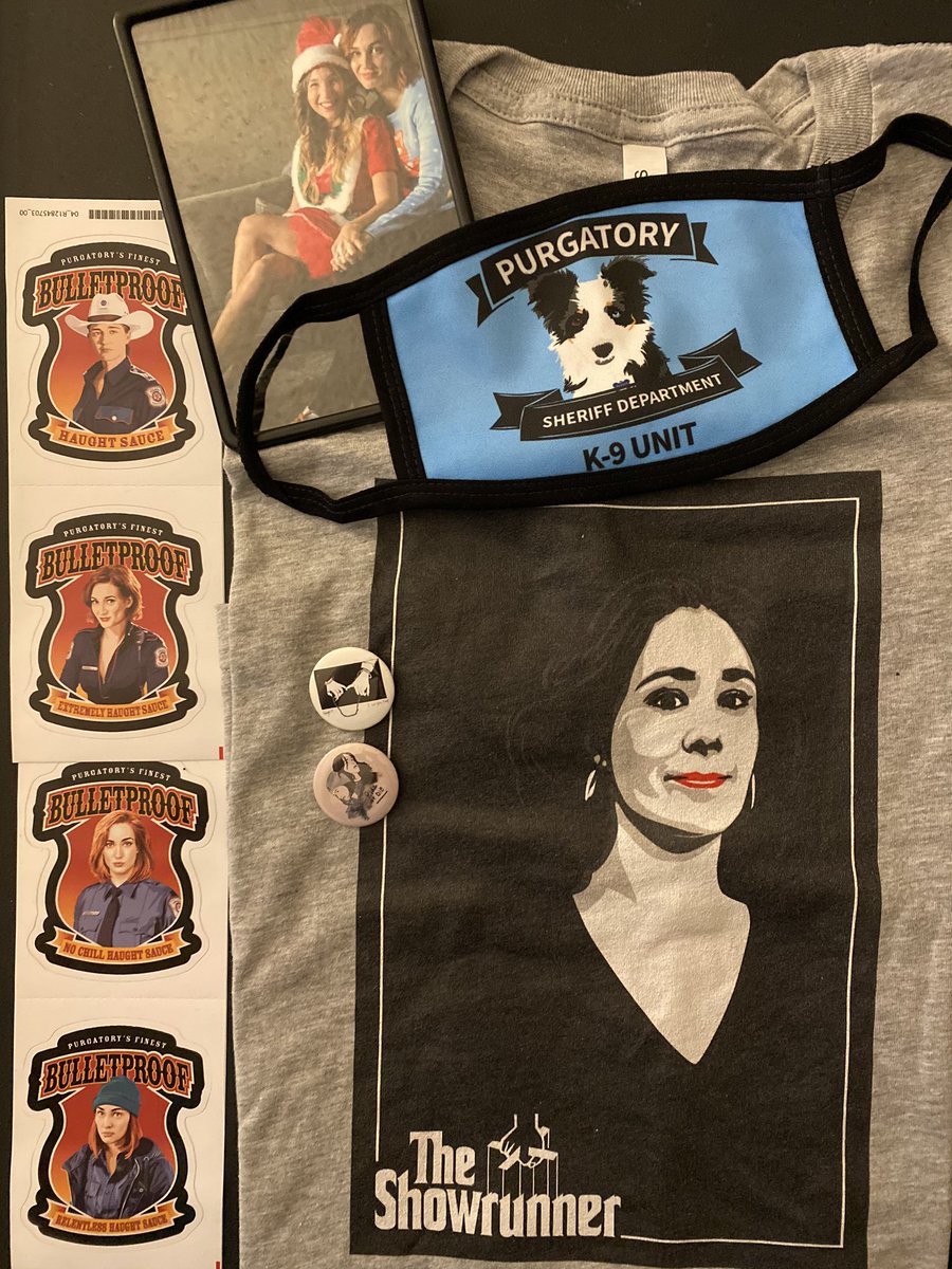 HilaryDF's tweet photo. Ready for an #EarpItForward giveaway? Rules are easy. Simply RT this tweet! Up for grabs are: (1) The Showrunner shirt ft. @emtothea. (4) Haught sauce stickers. (2) 1.25” WynHaught Ride or Die buttons. (1) Wayhaught photo in a magnetic frame. (1) Bernie K-9 mask. #WynonnaEarp https://t.co/8SGTEW7izz