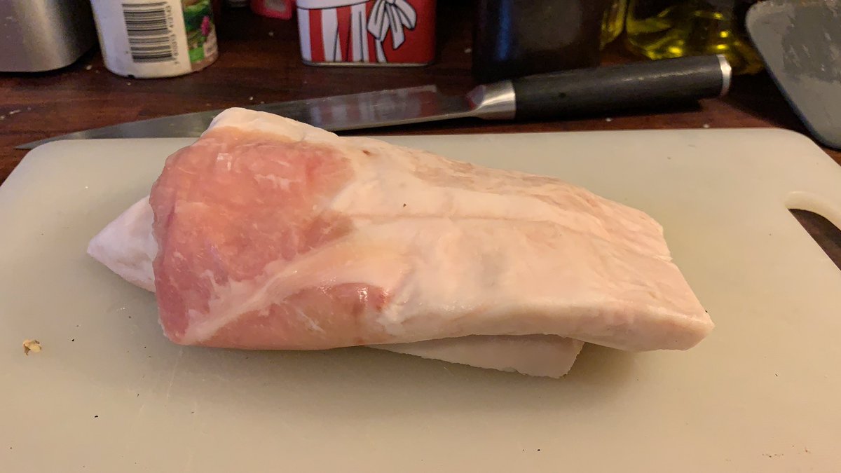 I have this hunk of pork back fat here, which is going to help things along no end.