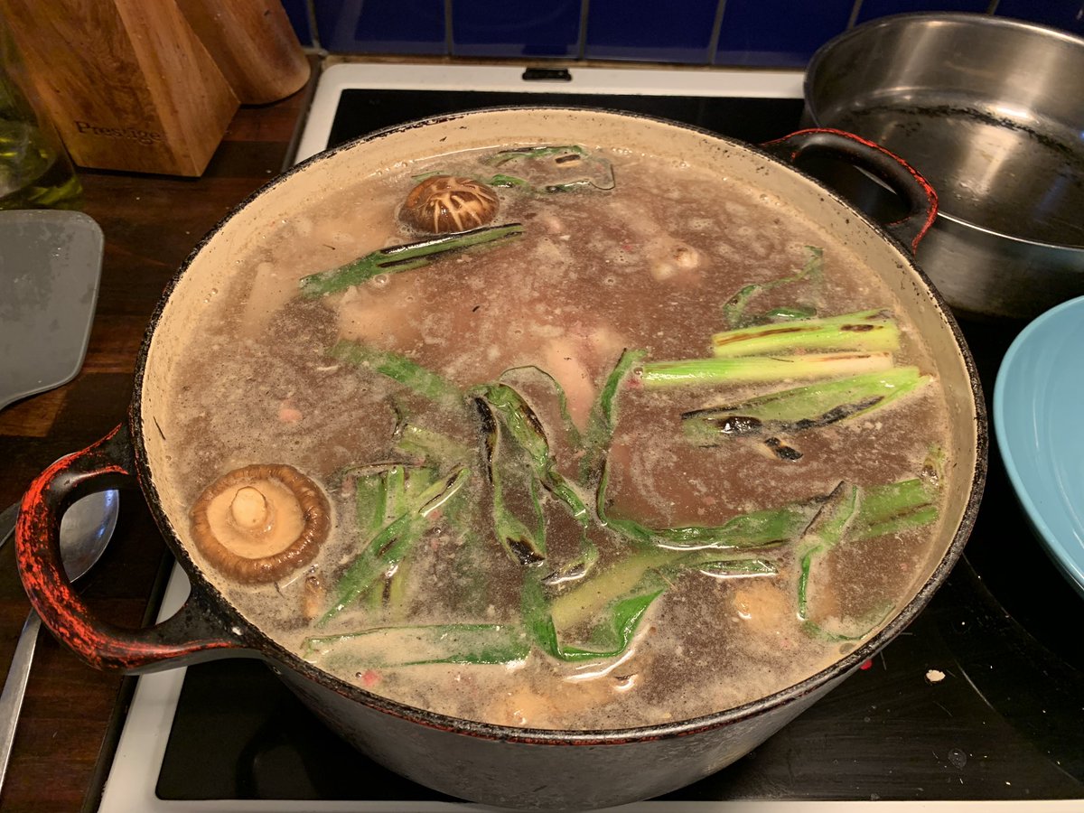 Everything but the back fat in, plus two dried shiitakes and about five litres of water. Ready to bring to the boil, and then do a light skim of only the grossest stuff that comes to the surface (we are NOT going for a technically perfect, clear stock here. No siree)