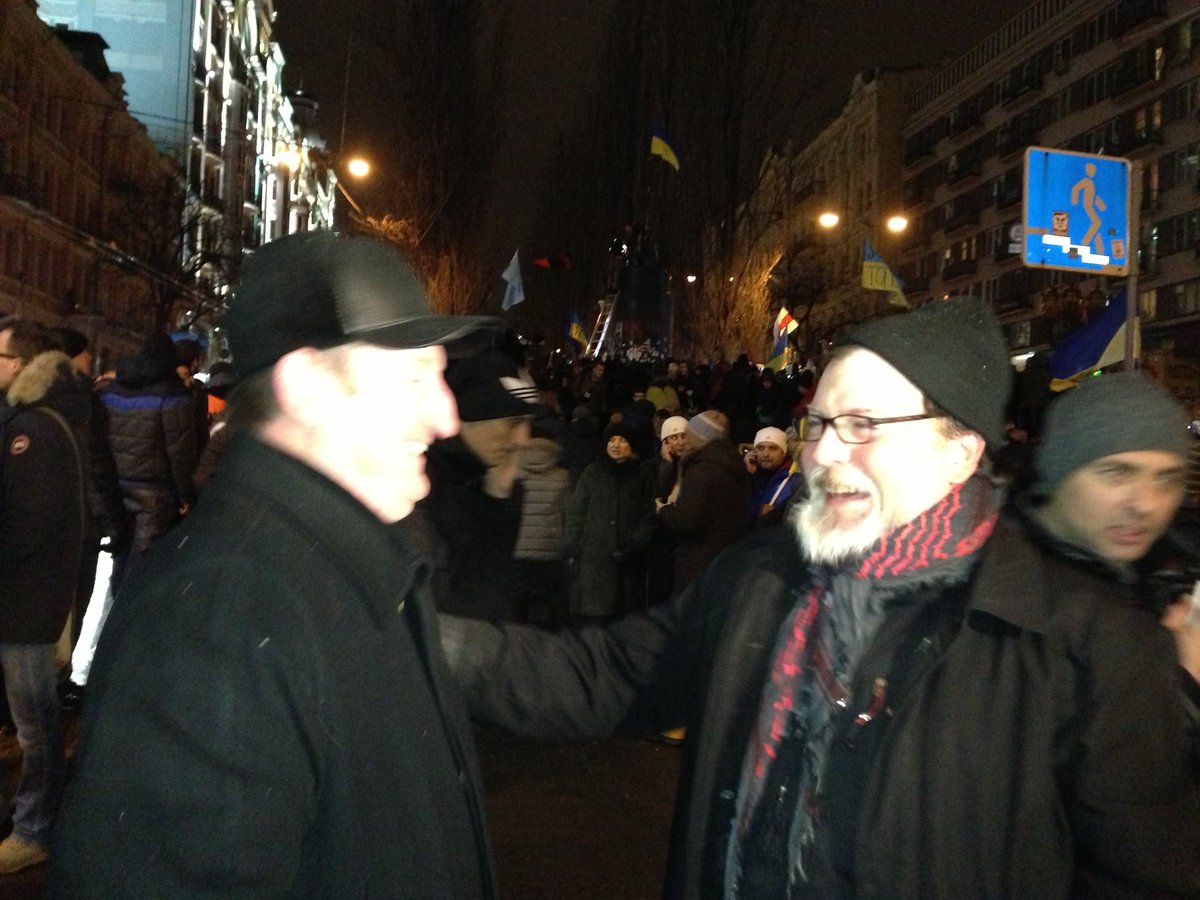 During the Euromaidan, Ratushnyy took several photos with Marko and Ulana Suprun, everyone's favorite diasporan Banderite power couple. Also in the first pic is OUN-B leader Stefan Romaniw ("my combative deputy"? ["mій бойовий заступник"]) and his wife:  https://www.facebook.com/photo.php?fbid=740926875936881&set=pb.100000587270958.-2207520000..&type=3