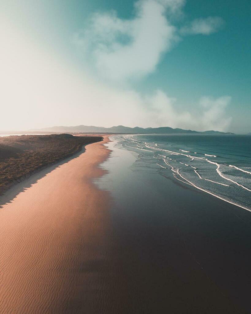 Sandy Point surf beach with Wilsons Promontory in the distance, Victoria, Australia [2426x3032][OC] IG @Creative.Casualty - Author: myfacelookslikeafoot on reddit - Youtube (sUbScRiBe) youtube.com/channel/UCgq_t…