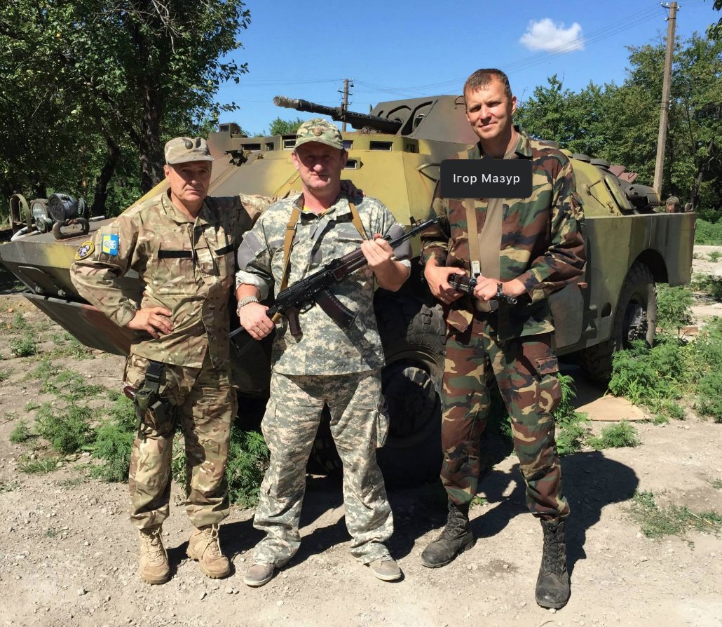 July 2015, Ratushnyy with UNA-UNSO's Igor Mazur. According to this Facebook post, the man on the left, Olexandr Ushynskyi, who I believe was involved with UNSO and Right Sector, is/was a member of the UWCC presidium  https://www.facebook.com/photo?fbid=1106838349345730&set=pb.100000587270958.-2207520000..