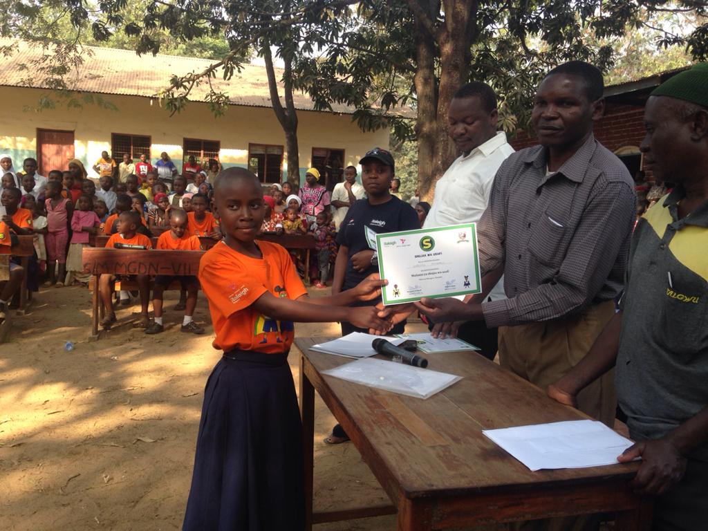 RaleighTanzania's tweet photo. Ealier last week, 20 students from Mgudeni primary school graduated from healthier lives, happier homes training on WASH as SWASH HEROES . Now they are ready and competent. They will cascade that education to their society as SWASH heroes. #healthlives #happierhomes #wash https://t.co/pgFgXeexAV