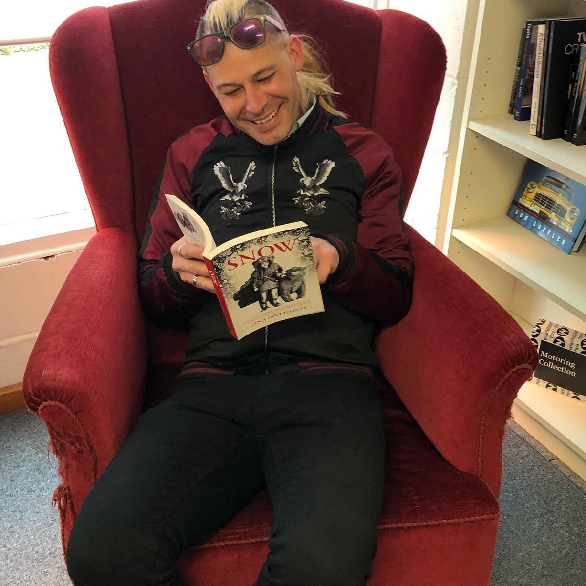 WakefieldPress's tweet photo. Jonny Inverarity has been our warehouse manager for two decades now. Here he takes a break to devour his sister Gina Inverarity’s delicious @LoveOzYA novel SNOW. #dualcab https://t.co/8HgmaIdpNu