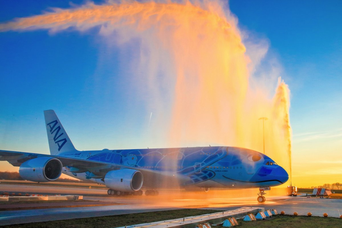 Eye candy from the <a href="/Airbus/">Airbus</a> files - first #A380 for <a href="/FlyANA_official/">All Nippon Airways</a> gets a salute after customer first flight 2019 in Finkenwerder <a href="/HamburgAviation/">Hamburg Aviation</a> #avgeek