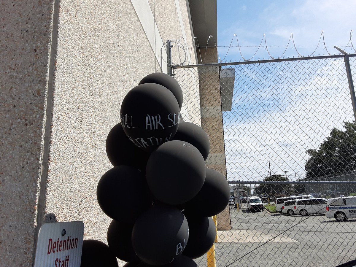 This all started with a demo in solidarity with people facing coronavirus in Alamance County jails. Here are some demands written on balloons, including air scrubbers with hepa filters and 6 ft social distance.
