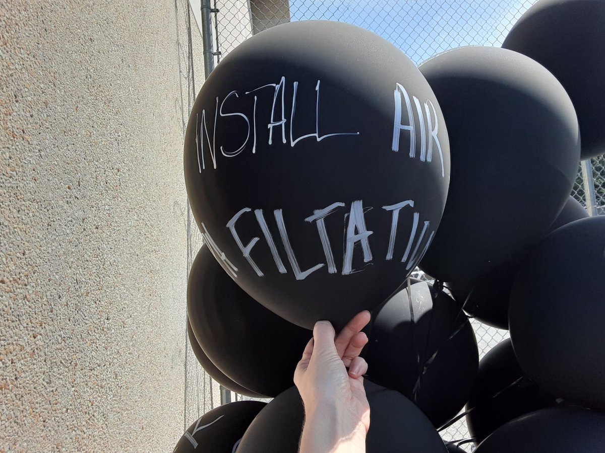 This all started with a demo in solidarity with people facing coronavirus in Alamance County jails. Here are some demands written on balloons, including air scrubbers with hepa filters and 6 ft social distance.