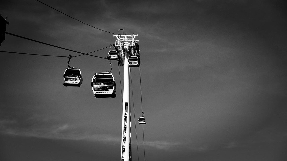 russgoffewood's tweet photo. Riding the cable cars in London. Quick and expensive but the kids like it. 
#bnwphotography #londonphotos https://t.co/w08xwrSwMi