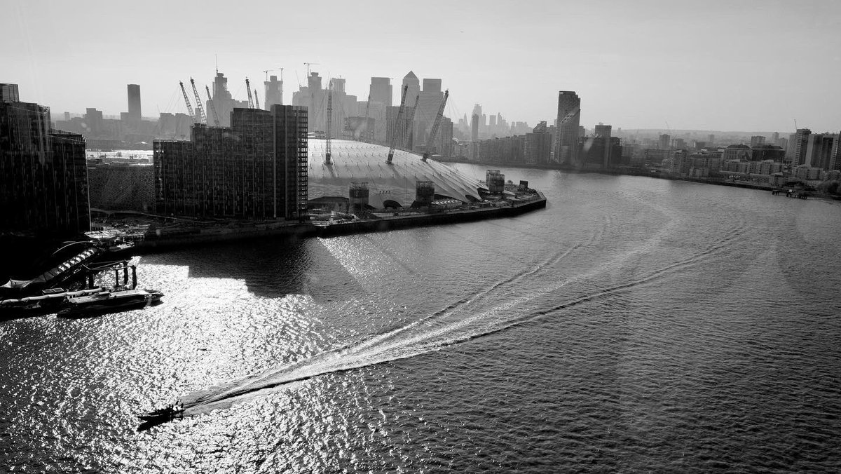russgoffewood's tweet photo. Riding the cable cars in London. Quick and expensive but the kids like it. 
#bnwphotography #londonphotos https://t.co/w08xwrSwMi