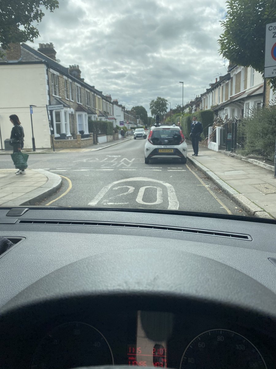 It seems the traffic enforcement cars are legally allowed to park on yellow lines?