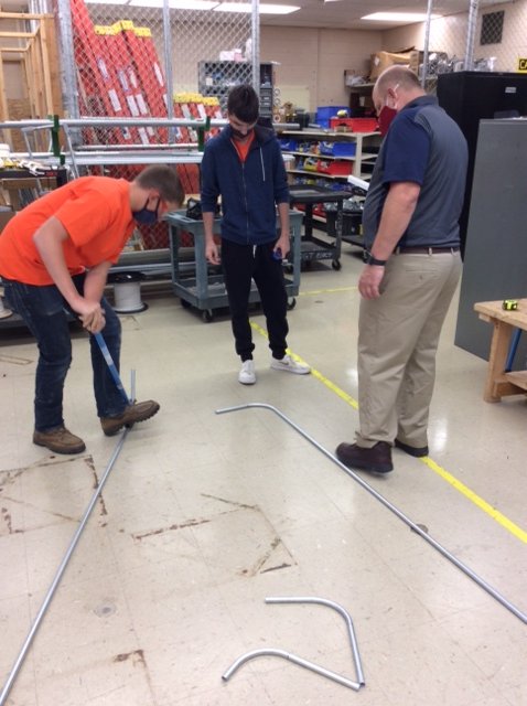 CPACTC's tweet photo. Bending Pipe in ECM (Electric. Construct. & Maint) @CPAVTS #cpavtsstudents #hybridlearning #inpersonlearning #schoolyear2020 #electricalstudents https://t.co/lJt50qmNYR