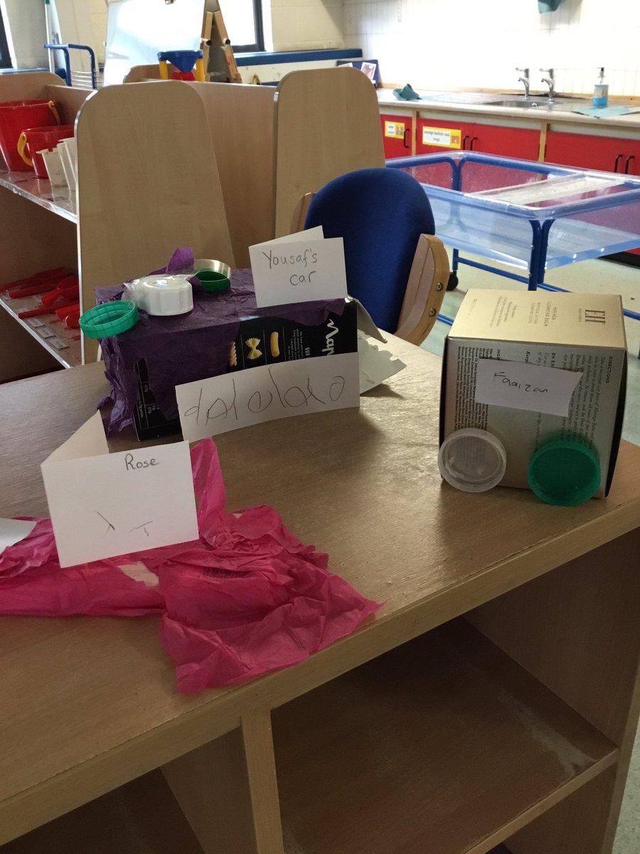 Primary_StJohns's tweet photo. More wonderful creations in our Nursery. Today Mrs Hoyle has shown us how to use the Box Modelling Area. Some of us have made cars. We used boxes and bottle tops. #boxmodelling #nurserymatters #nursery https://t.co/tWLJcvgWla