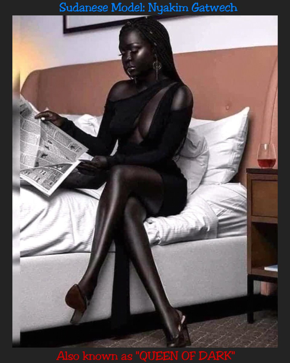 It is not art work on black stone or granite. She is Sudanese Model Nyakim Gatwech. The rarest Black Beauty. She enters Guinness book of World Records for the darkest skin ever seen on earth. She is also known as "QUEEN OF DARK".