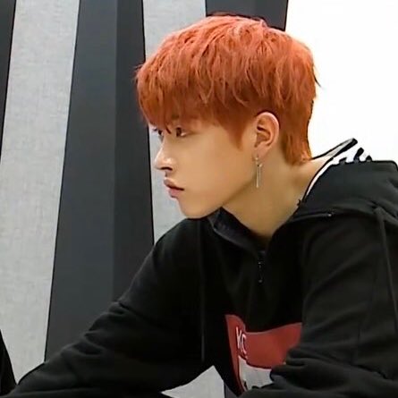 Petition for hongjoong in black hair for just once and then always in shades of red. For example, this carrot colour @ATEEZofficial