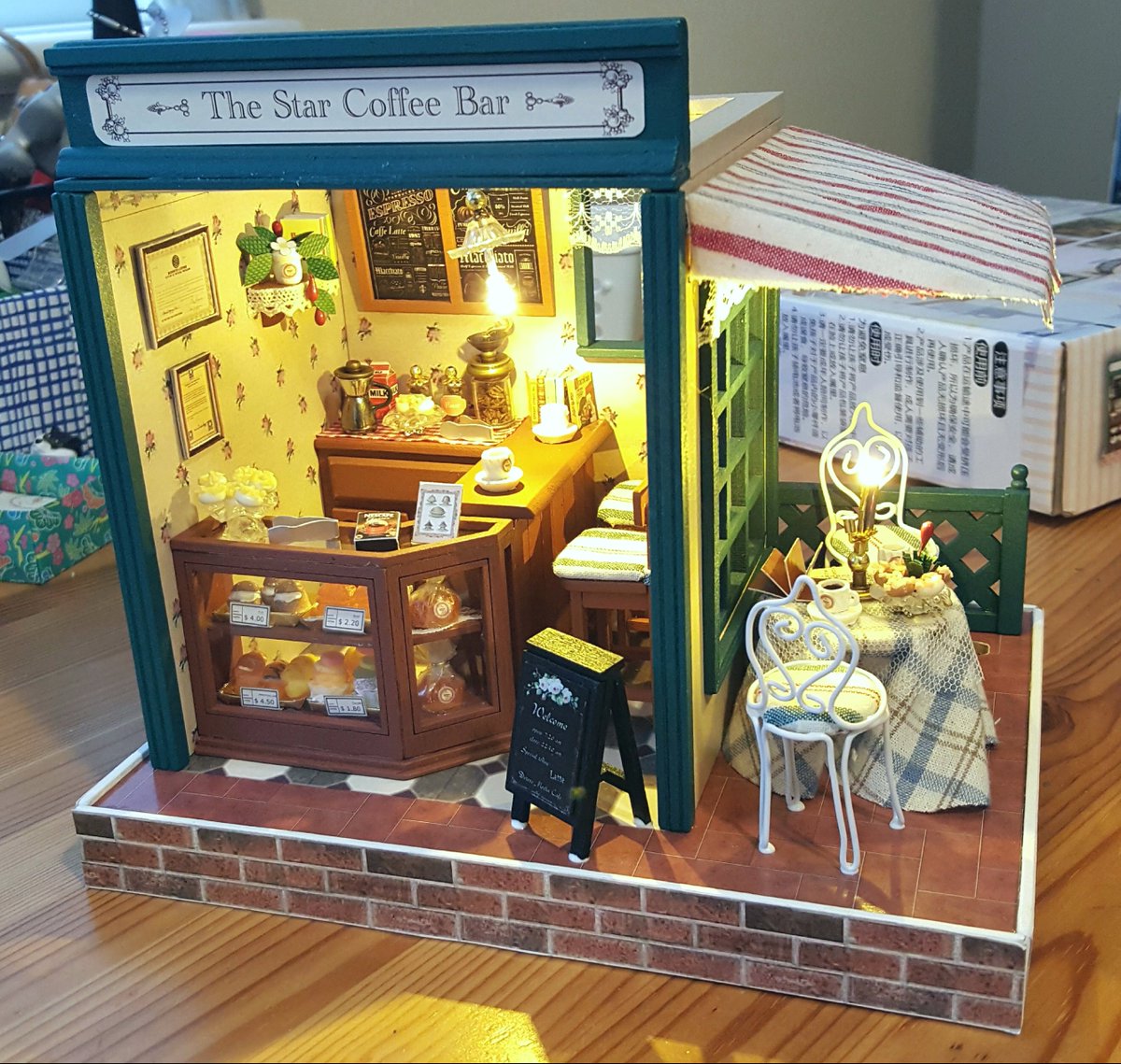 "The star coffee bar" lil café!!! Finally finished, the glue is still visible in some places since i just completed it moments before taking pics LOL most my other diys were homes but i wanted to do a shop one!! Love this one lots!!!