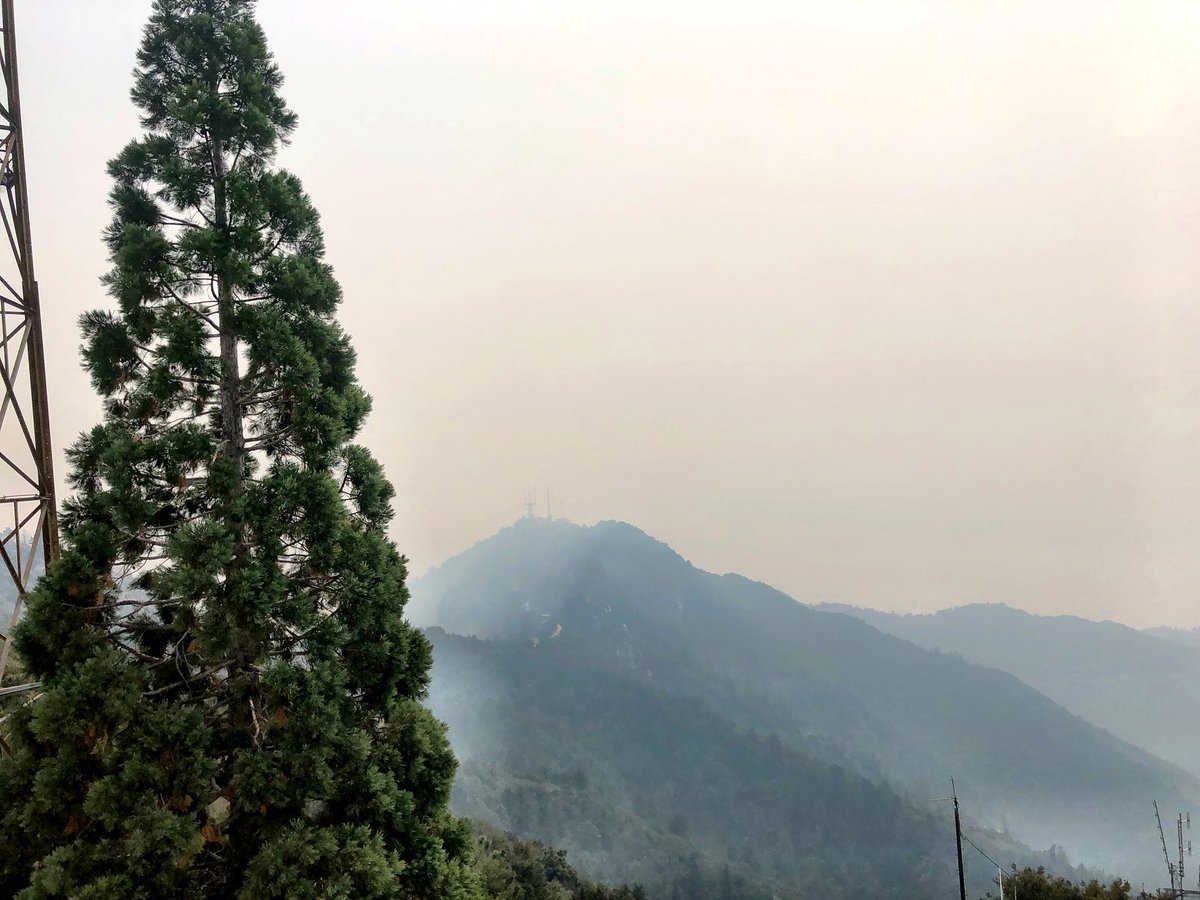 HarplaKPCC's tweet photo. @KPCC main transmitter site today at Mount Wilson. The #BobcatFire is on the East side of the compound and on the south at MountHarvard. Ground crews and dozers are doing an amazing job defending the observatory and the whole telecommunications farm. https://t.co/QkHHmSq8bN