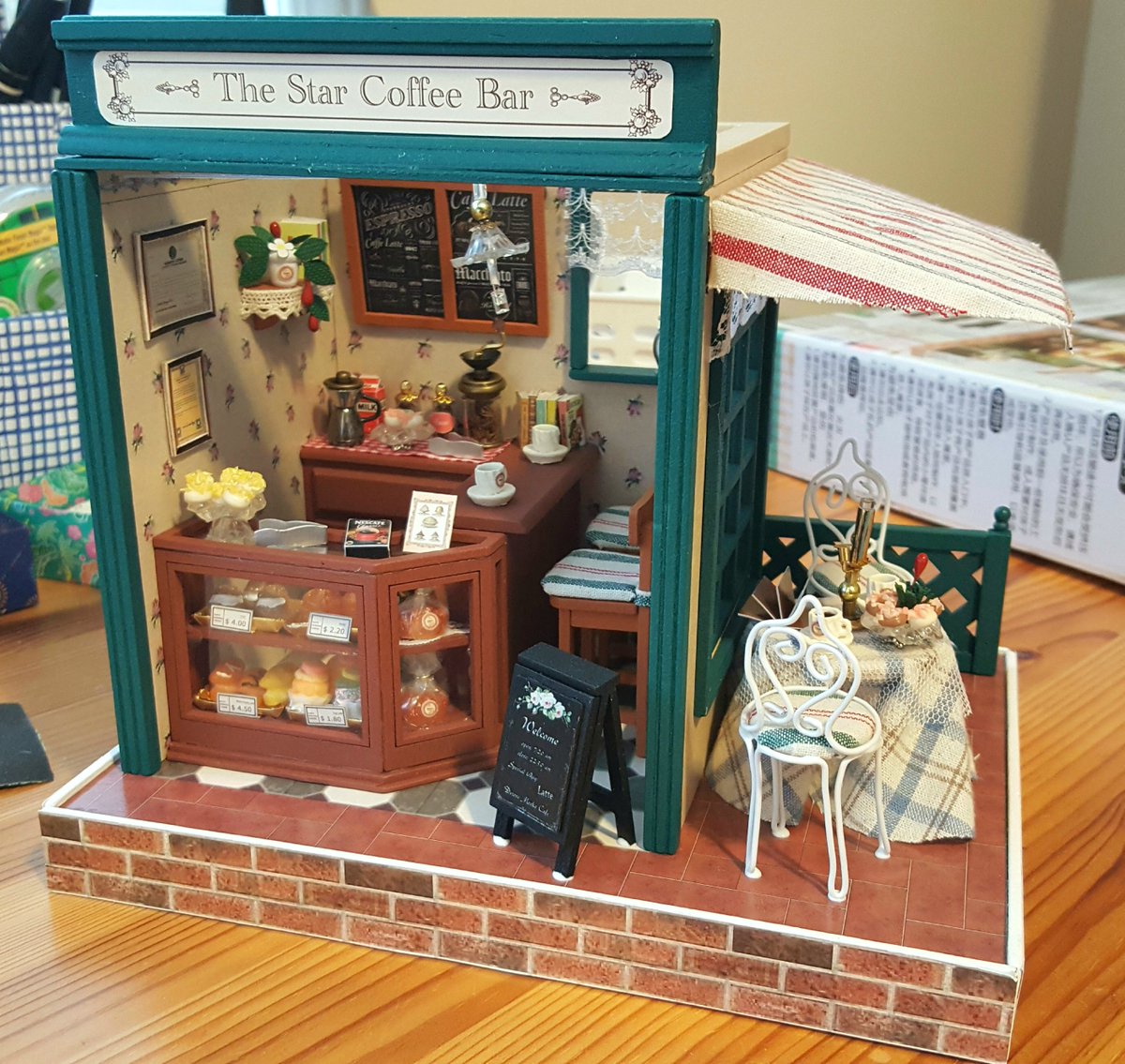 "The star coffee bar" lil café!!! Finally finished, the glue is still visible in some places since i just completed it moments before taking pics LOL most my other diys were homes but i wanted to do a shop one!! Love this one lots!!!