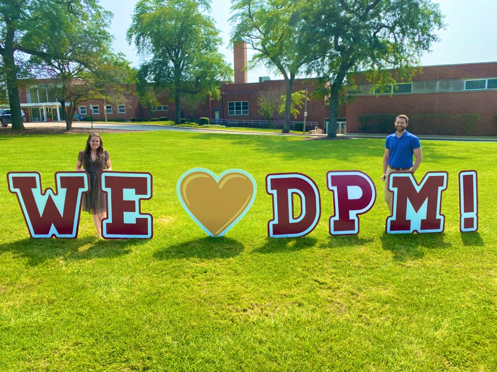 PrincipalHerion's tweet photo. Thank you to our AWESOME APT for showing our community that We ❤️ DPM! Mr. Paulsen & Mrs. Eigenrauch (socially distanced & outside at nearly 15 ft) smile as we welcome back students to in-person learning this week! #dpmchampions #deerpath https://t.co/n5wG0kOFVB