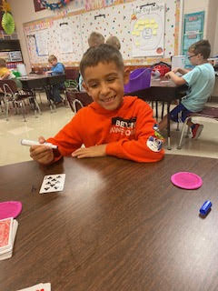 PWE_Splendora's tweet photo. In Mrs. Kinard's 1st grade class, students were given a playing card from the deck and had decide the number that comes before and after it.#pweAllGoodInTheWoods #pwerocks #wearesplendora #iamawildcat @SplendoraISD https://t.co/WFECjh6x4M