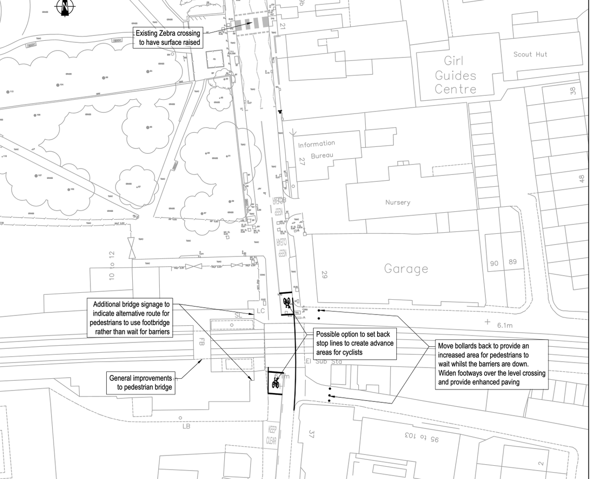 RichmondCycling's tweet photo. Oh no. We've just spotted the 'level crossing improvements' to Sheen Lane / Mortlake Station as part of the @info_stag development. They are **literally** moving bollards and slapping some paint down. https://t.co/sZAwL1Rska