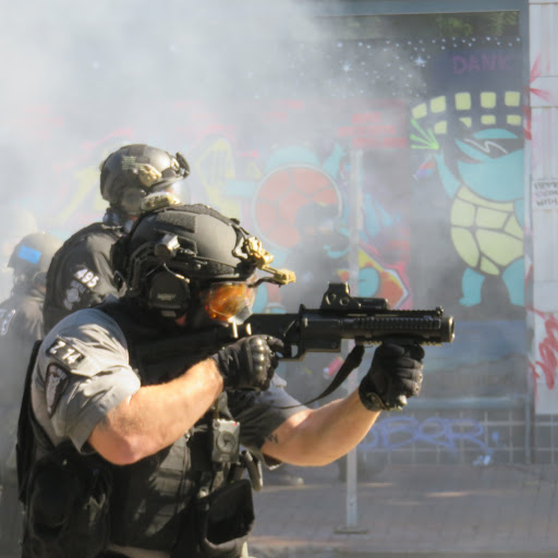 And they provide armor to keep SPD SWAT safe from harm as they do harm to others. Here’s a SWAT officer firing rubber bullets at a crowd near Cal Anderson sporting a helmet purchased in 2017 with  @SeattleFdn's $90k general support grants. (9/14)