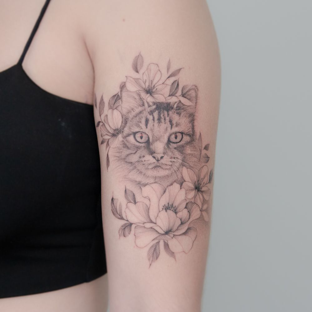 Floral Cat Tattoo: A Blossom of Style