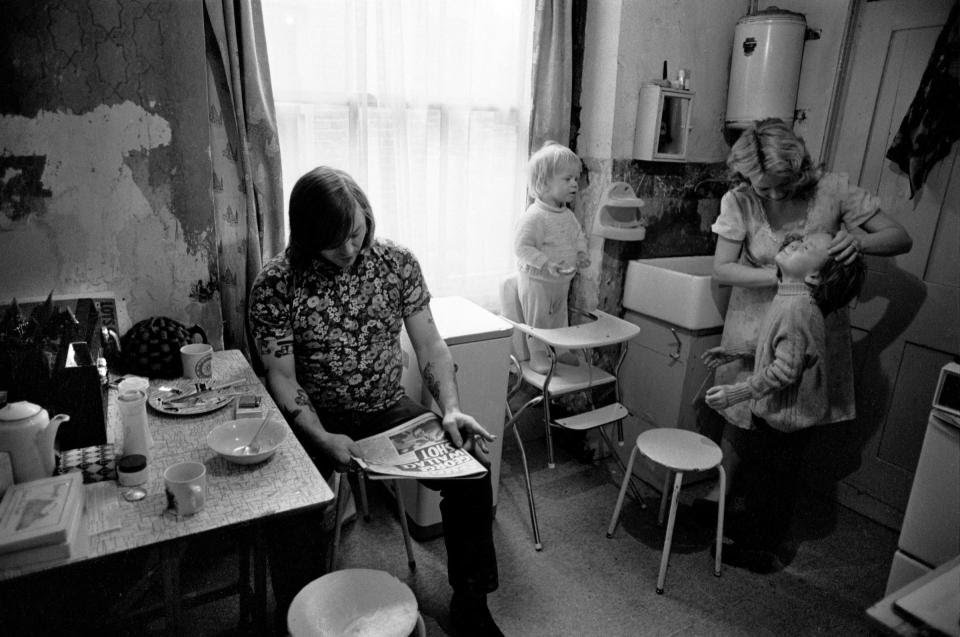 Fulham, London, 1972.A family have just finished breakfast; they don’t have their own bathroom but share one with other families in the multi-occupancy house.Photo  @HomerSykes