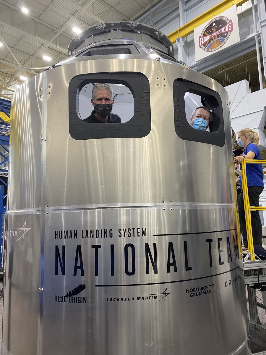 blueorigin's tweet photo. Blue Origin’s Nick Patrick and Mike Good, former @NASA astronauts, visited @NASA_Johnson to evaluate our National Team’s engineering mockup – a step in our journey to return to the #Moon. We are fortunate to have their experience to ensure astronaut compatibility. https://t.co/IBN5szSSVY