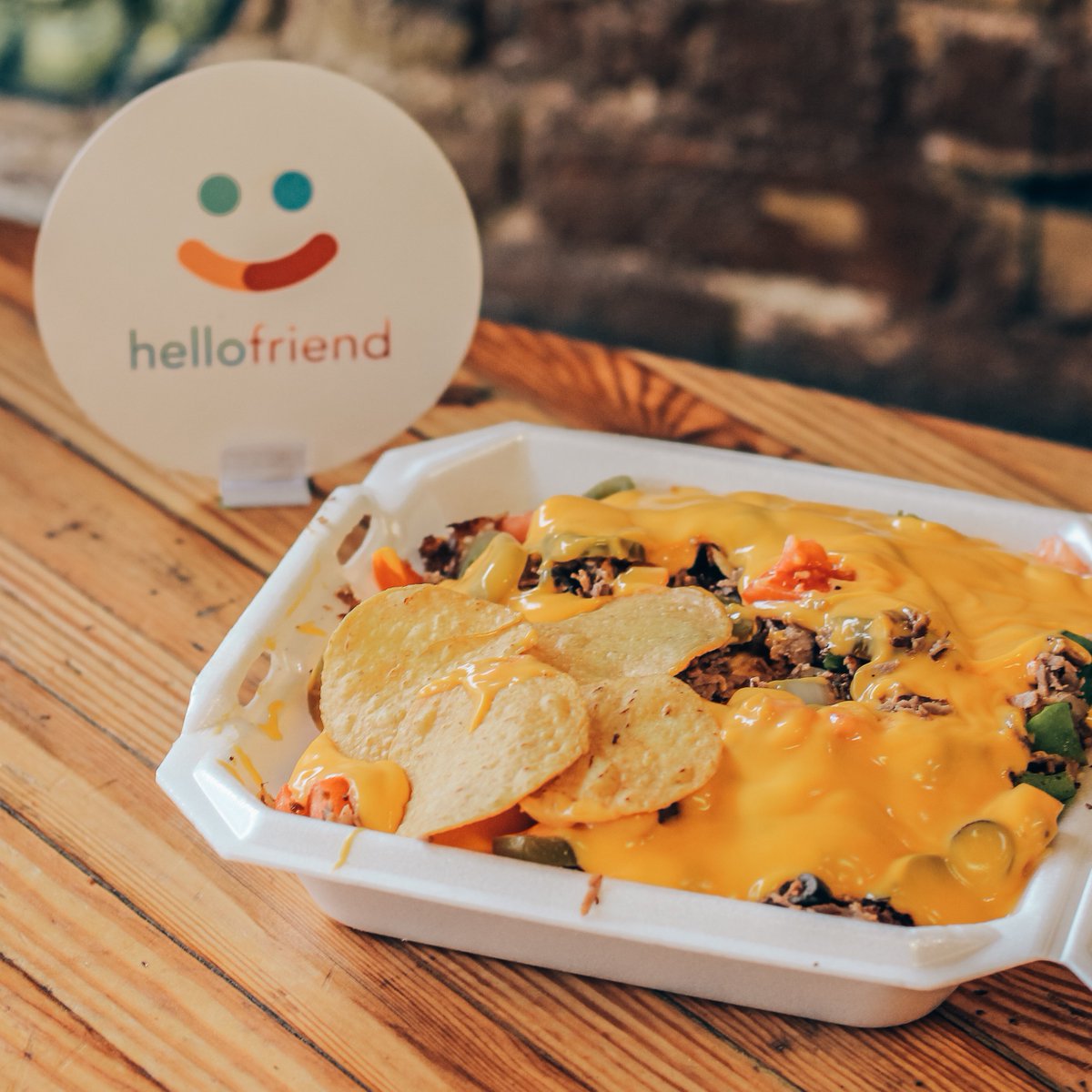 joinhellofriend's tweet image. All that cheesy goodness 🧀 Loaded nachos from @BoDillazRVA, available for order on Hellofriend!