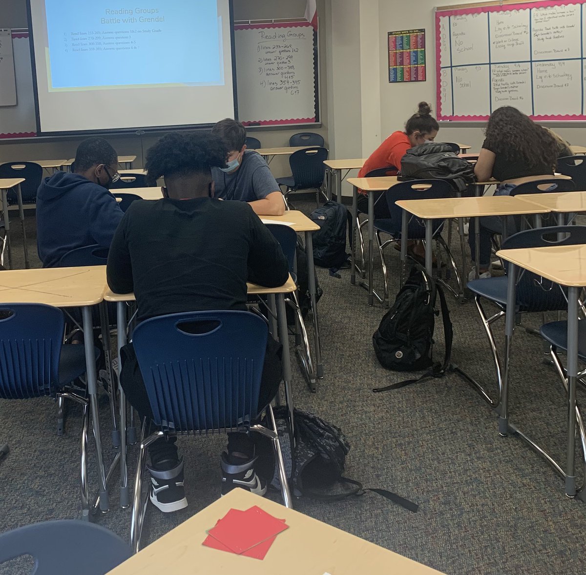 AHS_English4's tweet photo. Paired/group reading, 2020 style! Seniors taking an active role in learning, and discussing the epic battle of Beowulf and Grendel. @HumbleISD_AHS https://t.co/VhTIjazXox