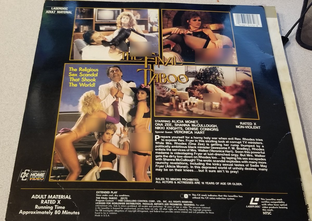 The back. Or maybe I should say "rear"? It says "Special guest: Veronica Hart", which apparently means she's an actress in the film, but isn't naked.