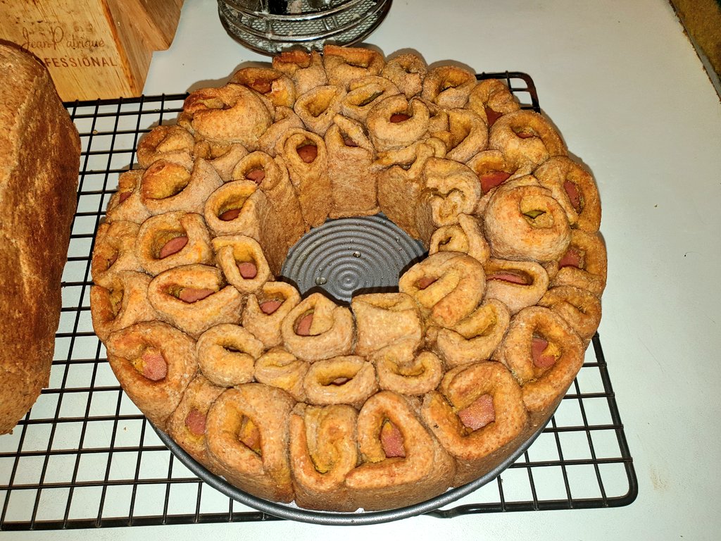Kevenlaw's tweet photo. @welsh_squirrel It's pizza dough wrapped around hotdogs 🌭 and then baked in a ring😊 It's from a recipe by the awesome @JulietSear_ on her #BeautifulBaking show, Ep1 😊🤗😊 You can find it on the @ITV player or on catch up TV 😊 #EatWellForLess #Baking #TuesdayMotivation #TuesdayThoughts https://t.co/uhrs4IEYFz