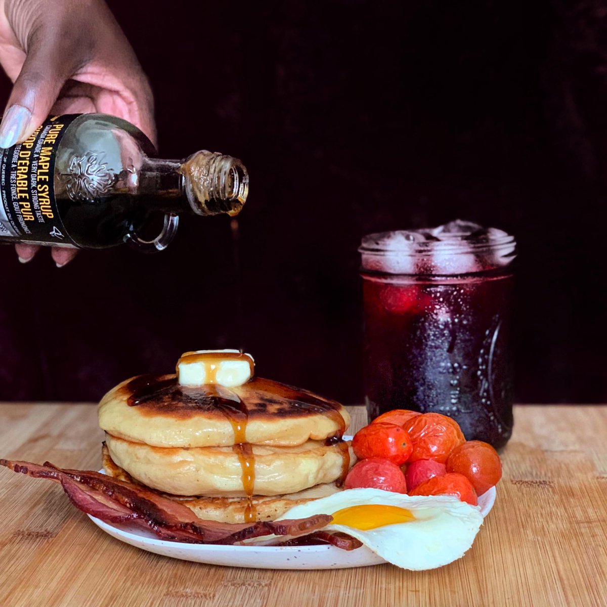 I’ve fallen into the lovely habit of starting my week with a lil’ brunch, prepped between morning meetings and calls.•cinnamon vanilla pancakes•double smoked bacon•bacon fat roasted tomatoes •fried egghibiscus iced tea with cucumber simple in the glass  #humblebragdiet