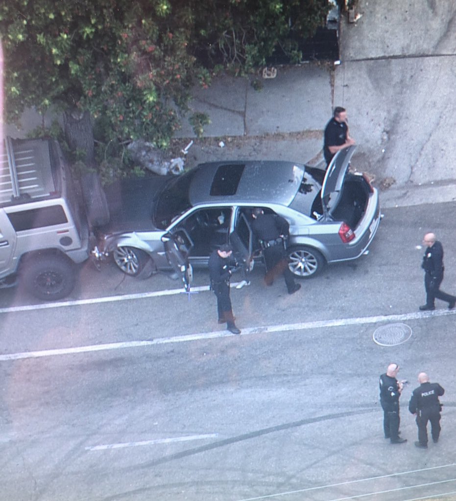 RoadSageLA's tweet photo. End of an INSANE pursuit/following of a narcotics suspect in Harbor City😰 suspect drove like a maniac up to 80 MPH on streets and in side walks before crashing at Normandie and 253rd street. Allegedly had A LOT of drugs in the trunk. One person in custody @CBSLA @LACoScanner https://t.co/DAtVXQMnSz
