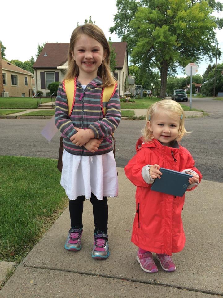 sarahekhunter's tweet photo. First day of Kindergarten (with adoring little sister alongside at the bus stop)... and now 6 years later first day of middle school and second grade, @SPPS_News iPads in hand. #SPPSFirstDay @GlobalArtsPlus https://t.co/cGx6okDnpb