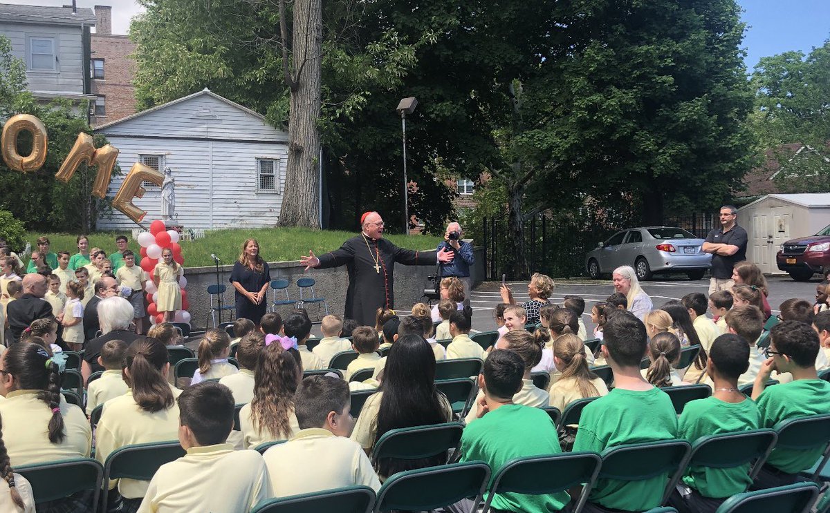 savestpaul's tweet photo. @CardinalDolan Do you remember these children? You visited their school 2 years ago. They love that school and their teachers, but you closed their second home without notice this summer. And for two months we’ve had no answers. Think about them #savestpauls https://t.co/stMFOrOOwl