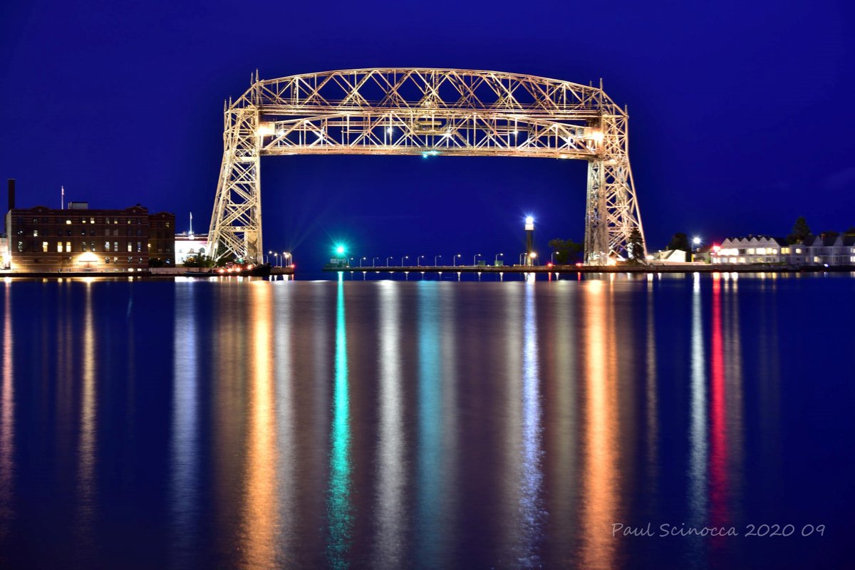 DuluthShips's tweet photo. The Aerial Lift Bridge raised and waiting for the arriving ship this Tuesday evening in Duluth
#landscapephotography 
#Aerialliftbridge 
#Duluth 
#GreatLakes https://t.co/JyQIQdVeVF