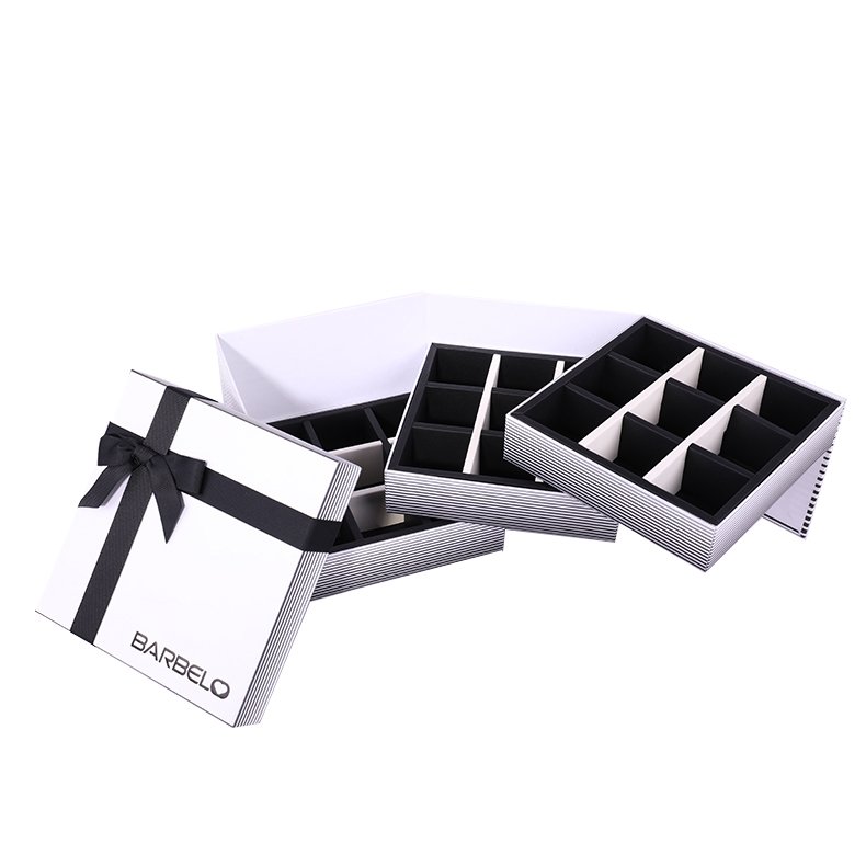 hcpackagingasia's tweet photo. It is a very typical but simple chocolate gift box in black and white color.
#ChocolateGiftBox
#ChocolatePackaging
#CustomChocolateBox https://t.co/M87A2VEPWO