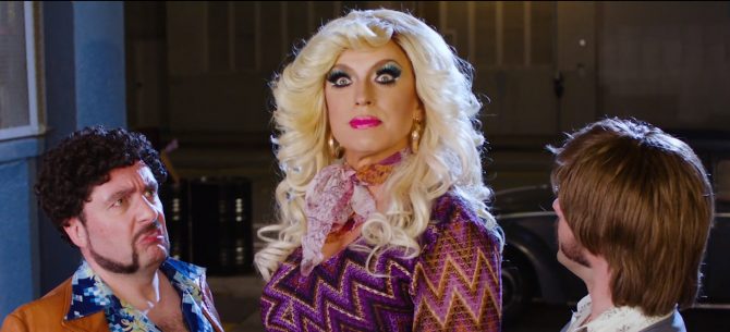 Queerty's tweet photo. Journey to a underworld run by a drag syndicate in ‘Sh*t & Champagne’ - More at: https://t.co/mrsodXy2A0 https://t.co/sASSVZUs2r