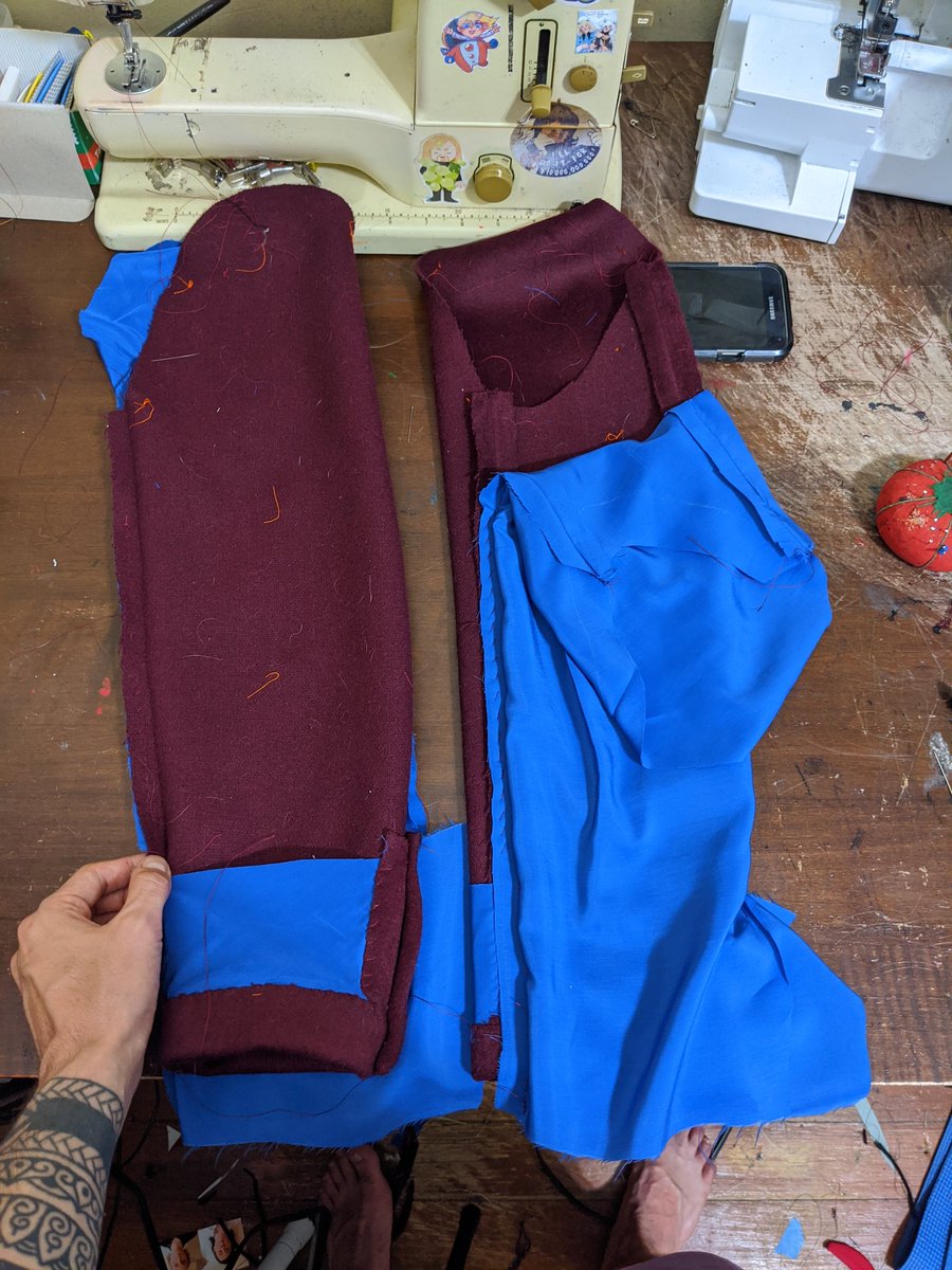Weird step I've never done before, you lay the sleeve on top of the lining, both wrong sides out, and stitch the seam allowances together to keep the lining in place, then pull it all through the lining (I nearly did it backwards)