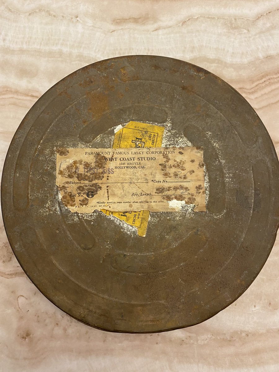 GUYS. I’m literally speechless. My grandma sent me (among other things) this film reel for my birthday. According to the slip she included, it’s from a 1928 LOST silent Paramount film called The First Kiss starring Fay Wray and Gary Cooper. Honestly I feel wrong to have this.