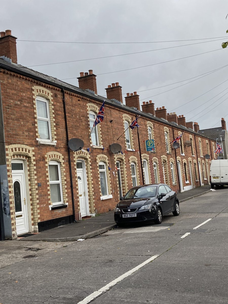 24.  #Belfast Olive Street still contains old style housing stock. I have many happy childhood memories of Woodvale Park & the Bandstand. Woodvale Presbyterian Church looking moody. 