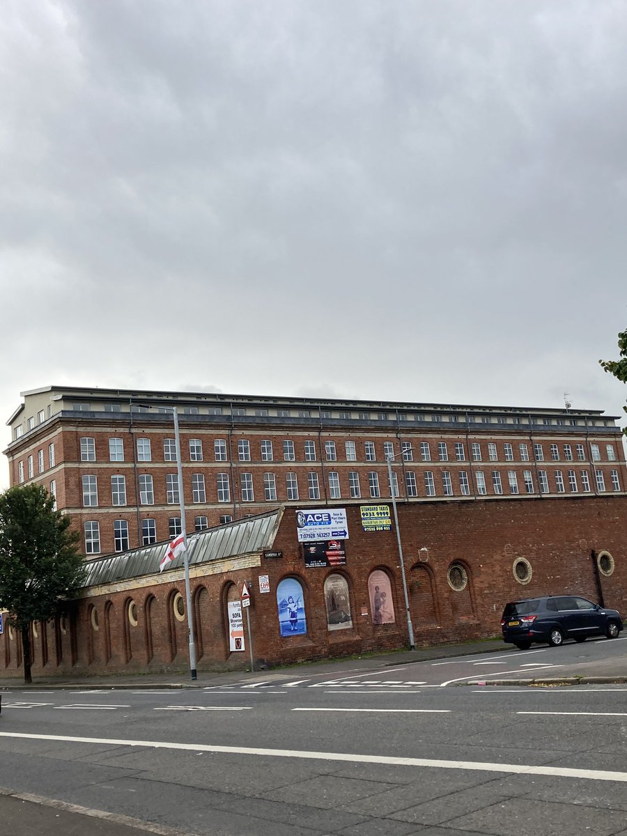28. Heading down the Crumlin Road. Edendale Linen Mill, now apartments. Statue of a “Millie” on corner of Crumlin Road & Cambrai Street by Ross Wilson.