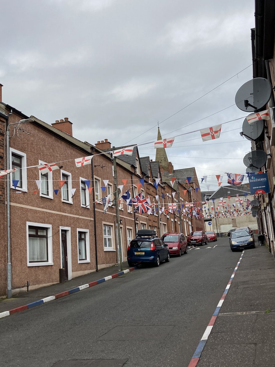 32.  #Belfast Disraeli Street. More murals & some off streets still with painted kerbstones. 