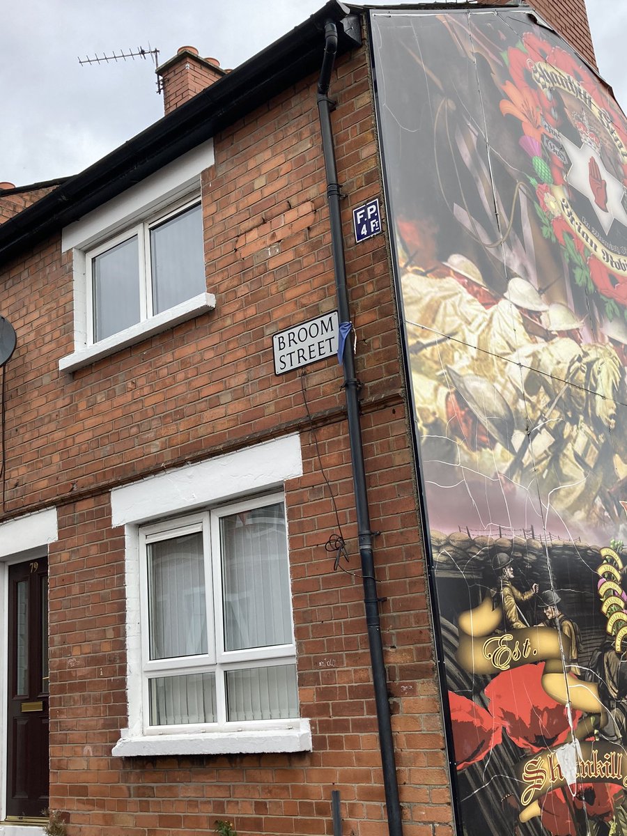 32.  #Belfast Disraeli Street. More murals & some off streets still with painted kerbstones. 