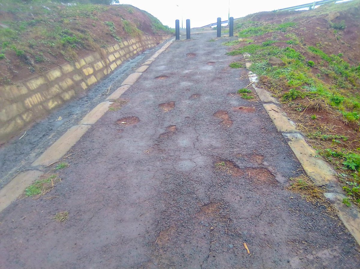 The entire project is riddled with sub-par construction, but as usual the pedestrians and cyclists are an afterthought. Retaining walls never built or half completed leading to erosion over the path. Potholes already appearing. Kenyans deserve better quality for their money