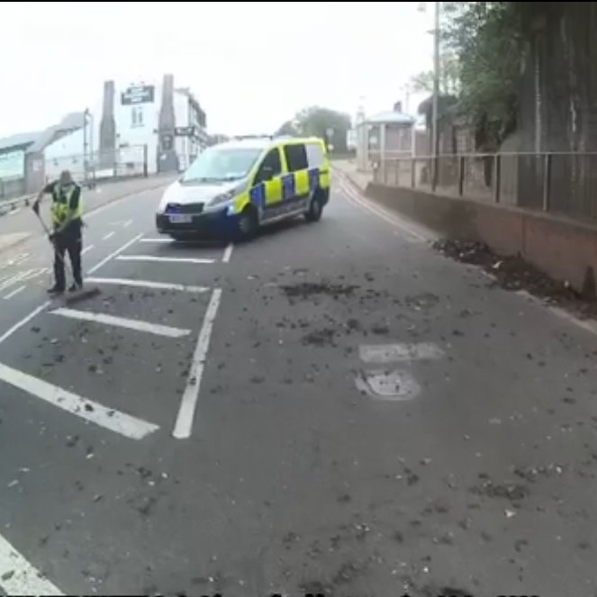 OldburyWMP's tweet photo. With large amounts of debris blocking one side of this busy main road, we didn't want any morning traffic been held up for too long. So decided to go and grab a couple of sweeping brushes ourselves! #somethingalittledifferent @WMPolice @sandwellcouncil @Trafficwmp @sandwellroads https://t.co/UzVoADtBcF