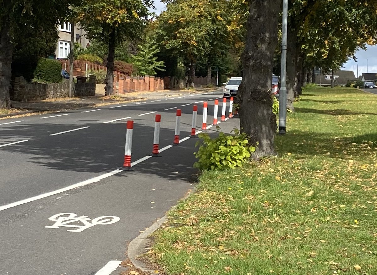 Now, we’ve got to talk about the trees, which are problematic twice over. They sterilise the overall space, and act as a barrier to visibility. This is the view a motorist turning right out of Watersmeet onto Rushmere Road, gets. ‘The cyclist appeared from nowhere’, they’ll say.